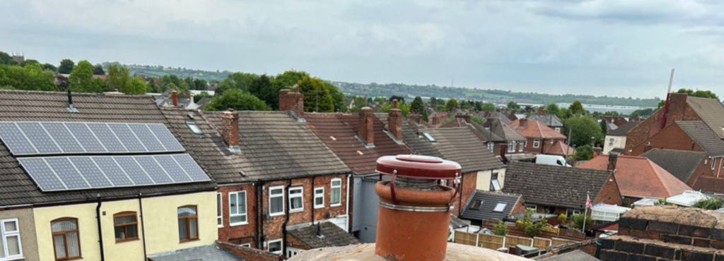 This is a photo taken from a roof which is being repaired by MCM Roofing Repairs Tisbury, it shows a street of houses, and their roofs